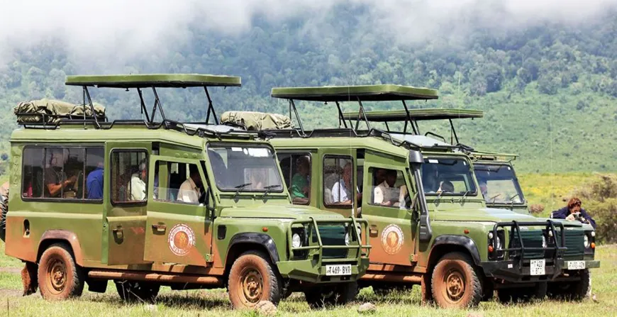 Karibu Africa Safaris 4x4 safari vehicles parked in a row