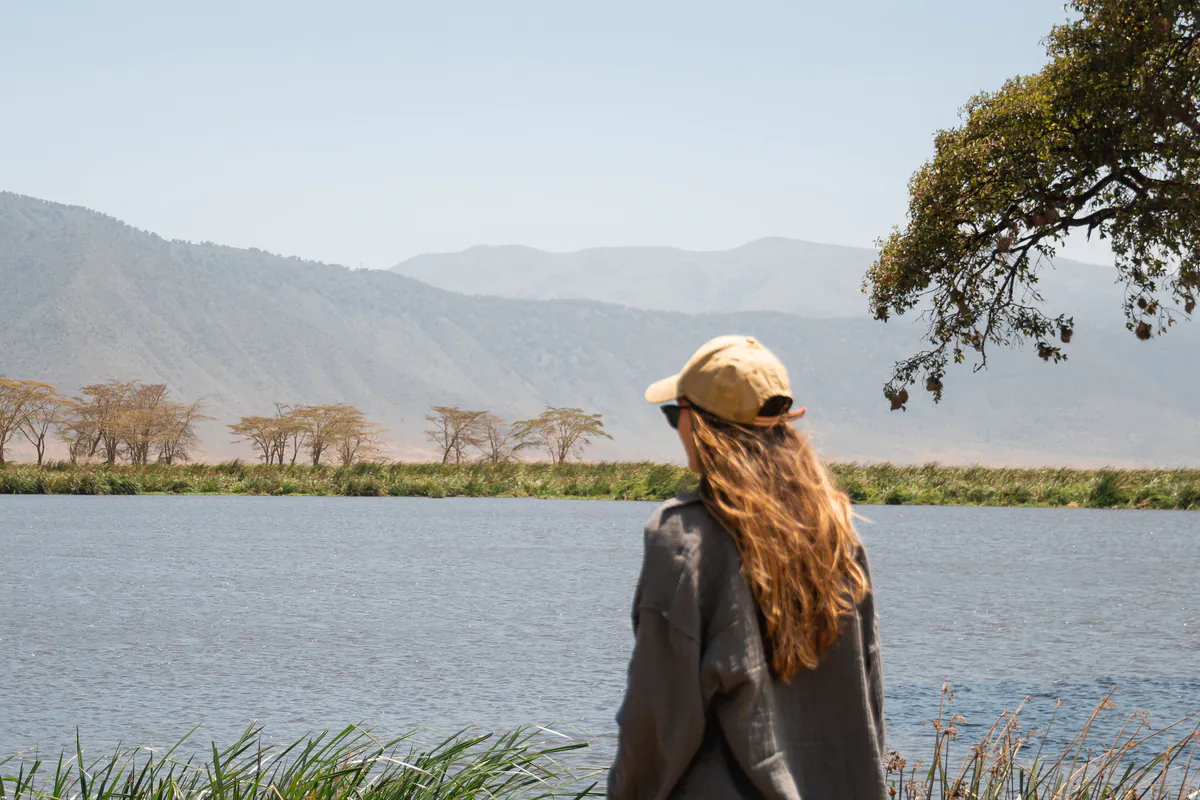 Traveller looking out over Lake Magadi in the Ngorongoro Crater